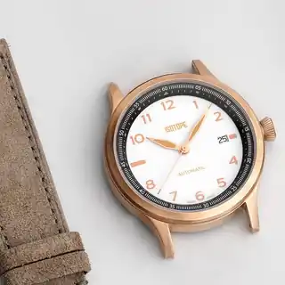 Case and strap shown separately in the maker’s photograph.