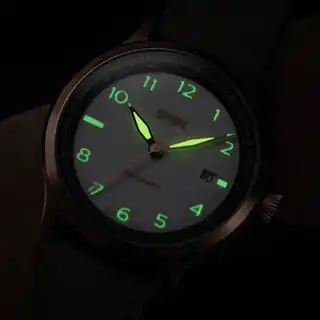 The maker’s low-light photograph; this is not a measured lume test.