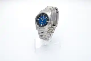 Midnight Blue on the titanium bracelet, viewed from an angle.