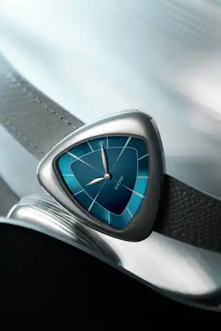 A closer view of the blue A1 Core dial and curved case.