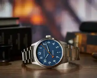 Blue-dial Olmsted 38 shown off the wrist.
