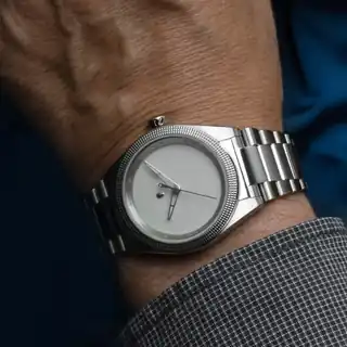 Flyway Cold Grey Enamel photographed on a wrist.