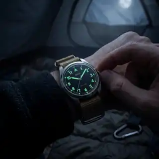Ironway’s low-light photograph of the Field Watch 38; not a measured lume test.